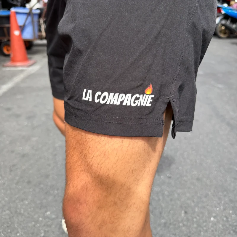 Short de sport (avec poches zippées)