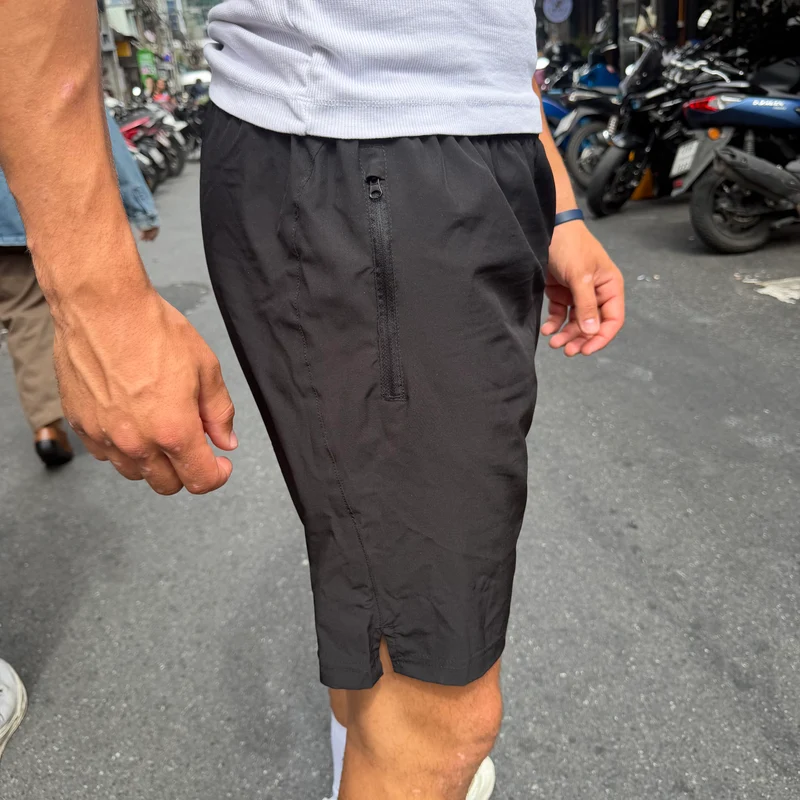 Short de sport (avec poches zippées)